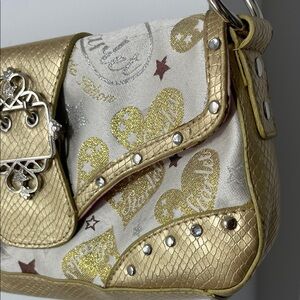 Paris Hilton Gold and Cream Clutch